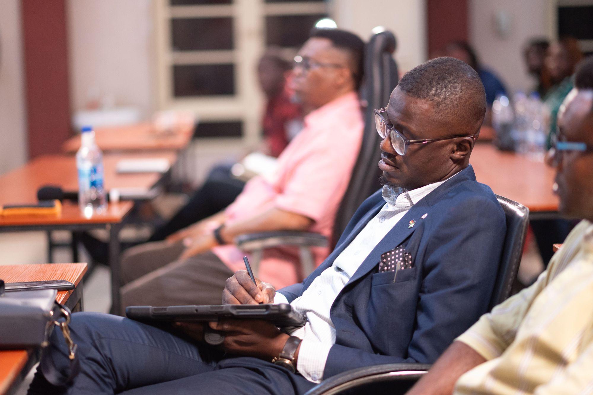 Delegate taking notes